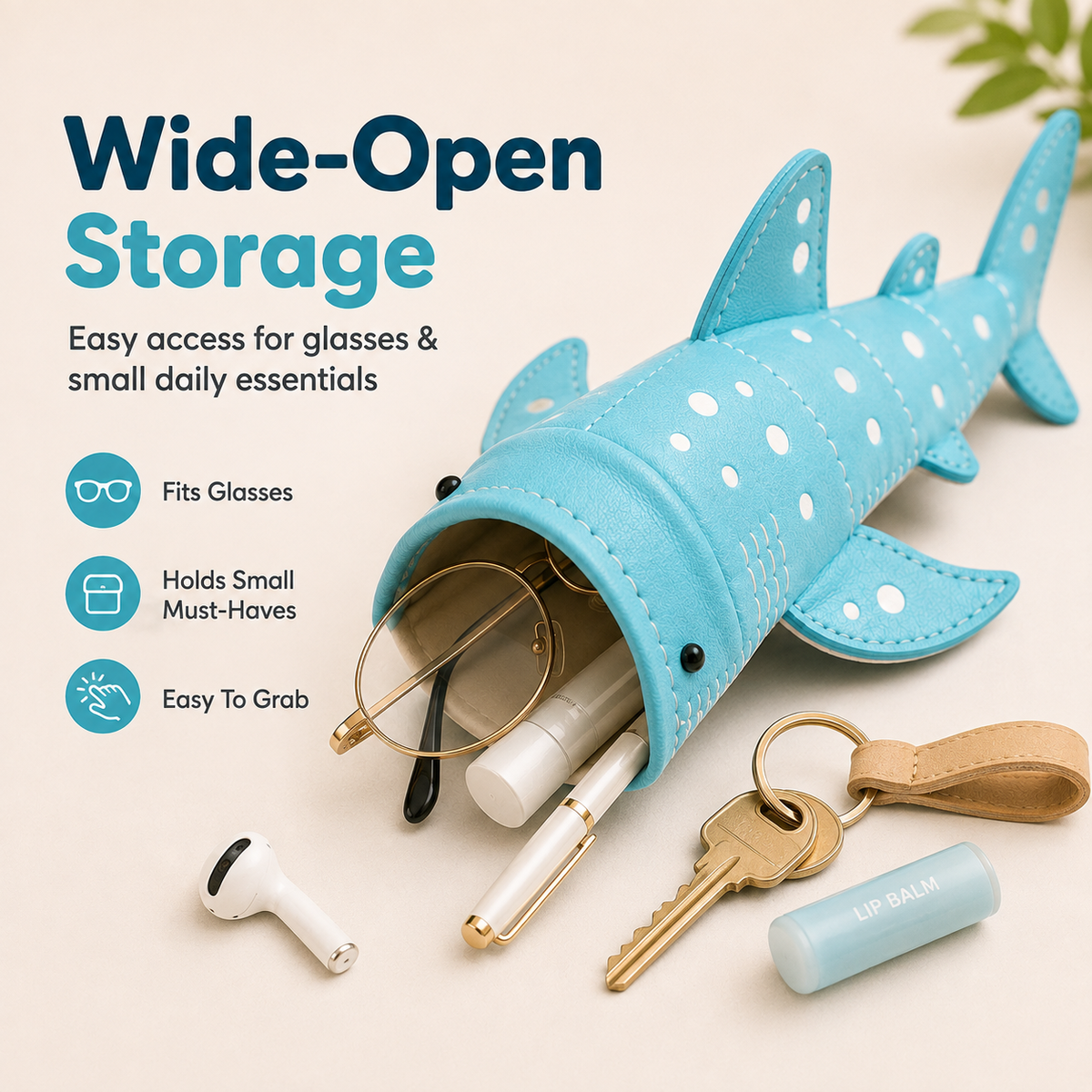 Wide-mouth shark pouch holding glasses and small essentials