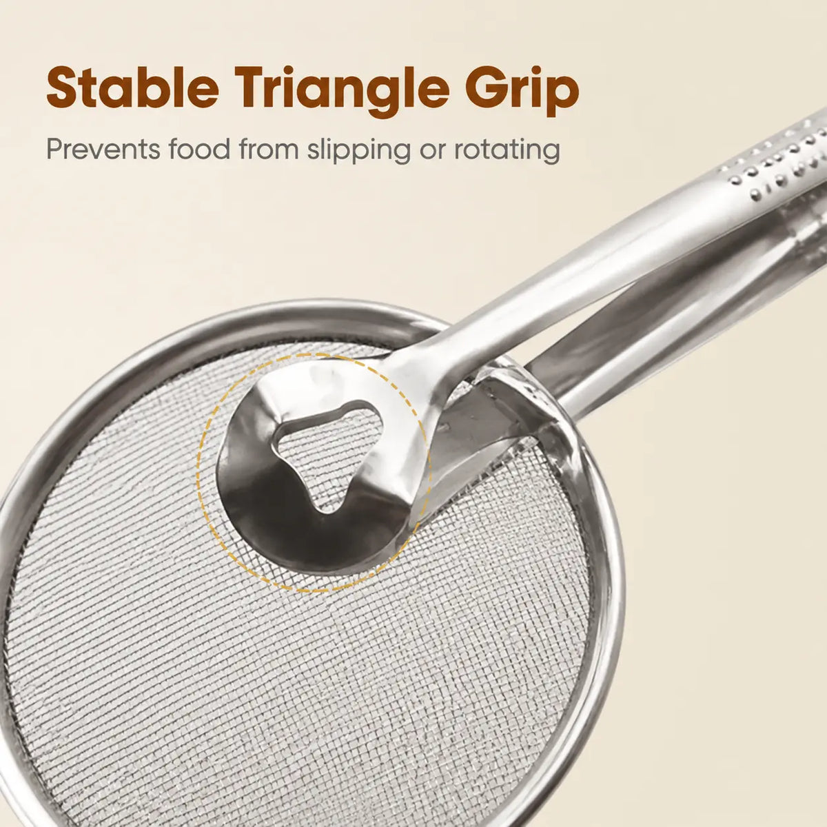 Close-up of the center gripping jaw on the frying tongs